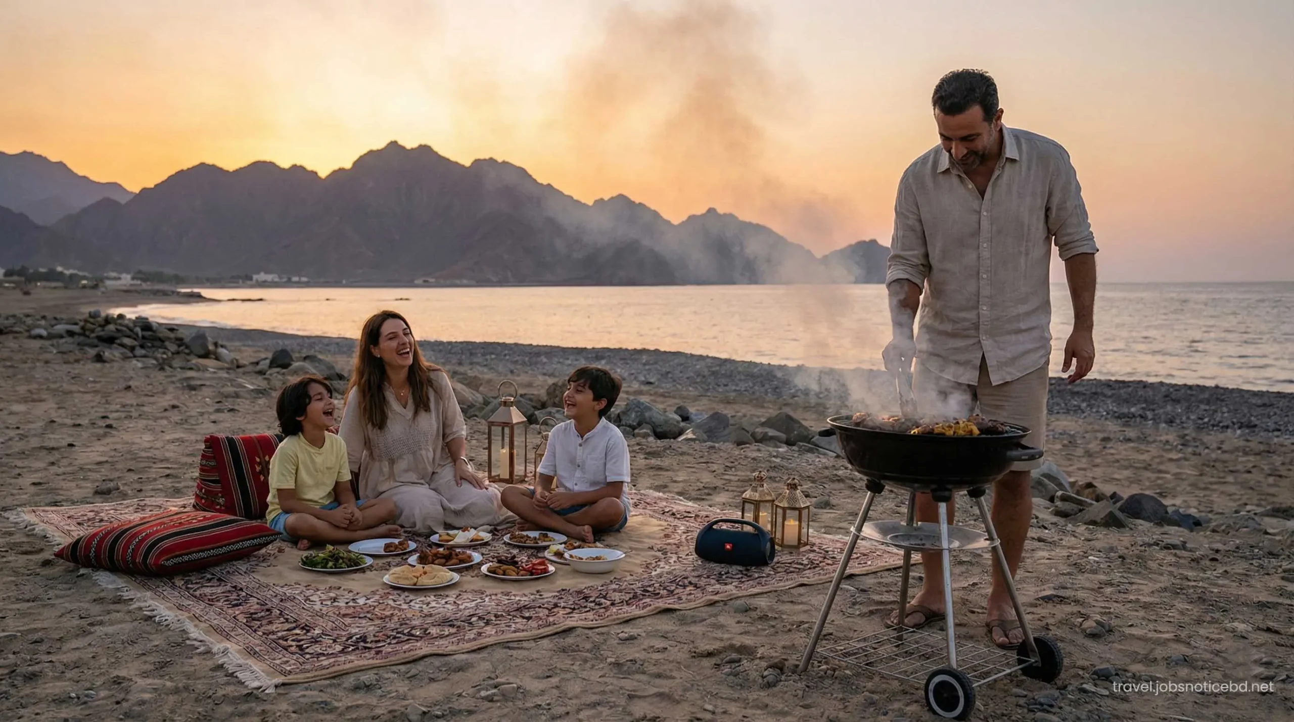 Family enjoying BBQ on Fujairah beach.
