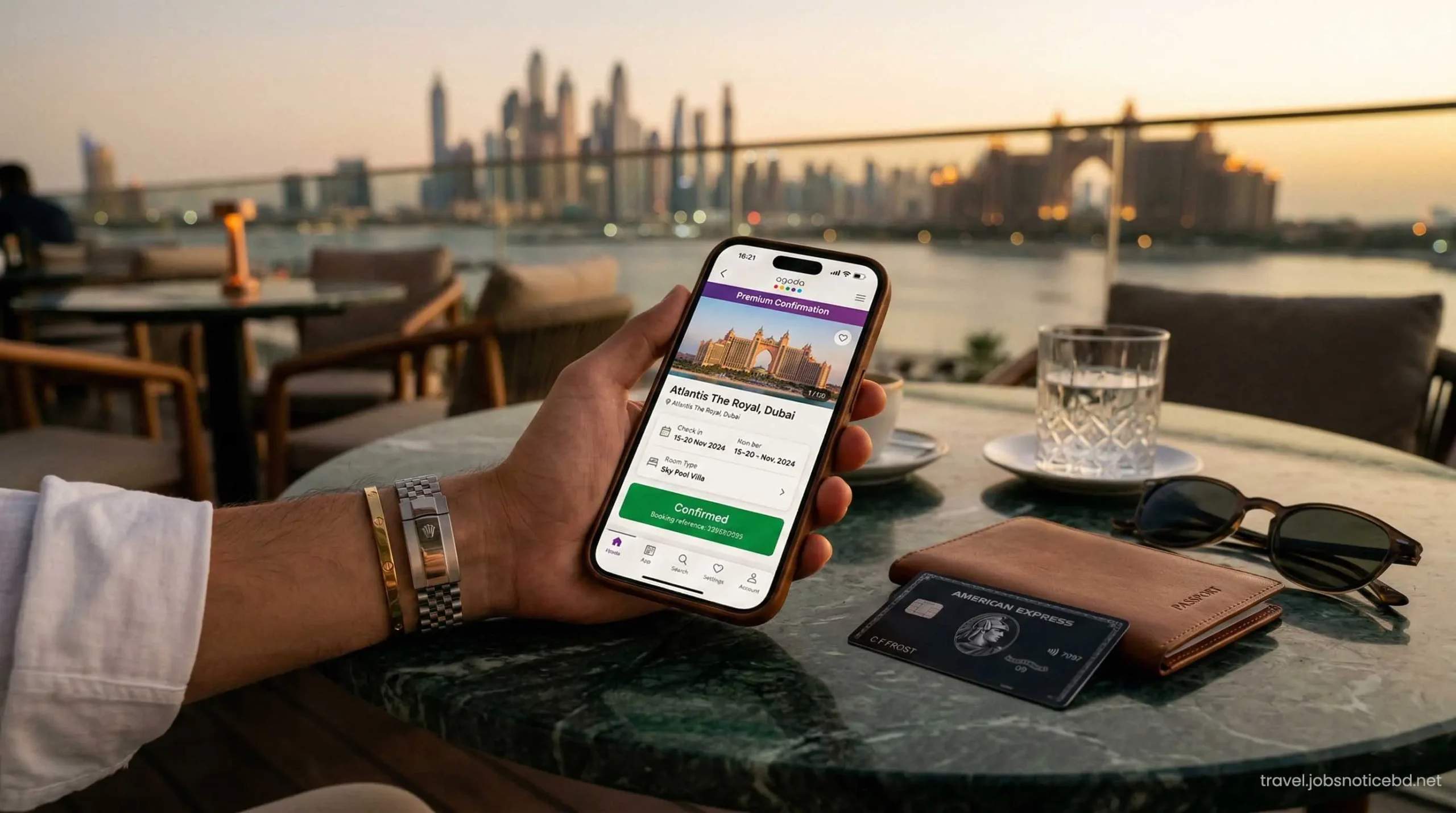 Using Agoda premium deals on a smartphone to book Atlantis Dubai.